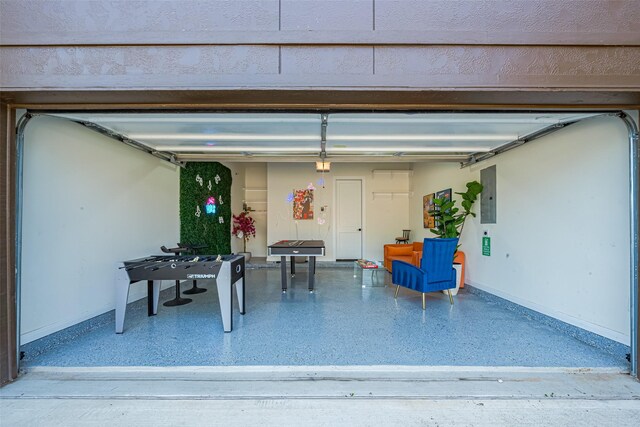 2909 Nagle St, Houston, TX 77004 - garage featuring electric panel and baseboards