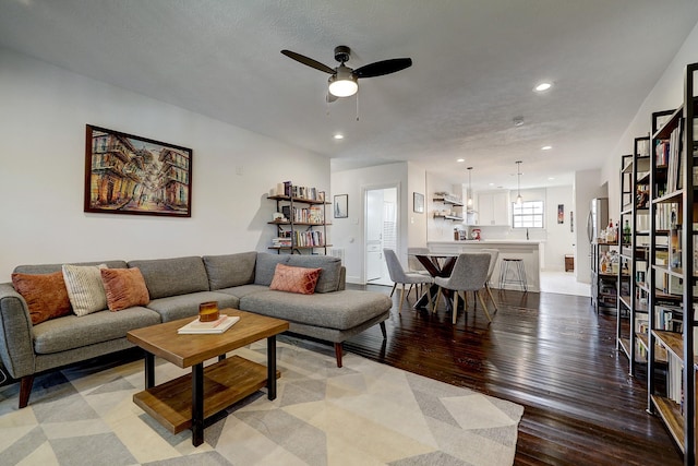 5120 Leeland St, Houston, TX 77023 - living area featuring ceiling fan, recessed lighting, light wood-style floors, and baseboards