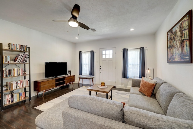 5120 Leeland St, Houston, TX 77023 - living area featuring dark wood-style flooring, ceiling fan, recessed lighting, and baseboards