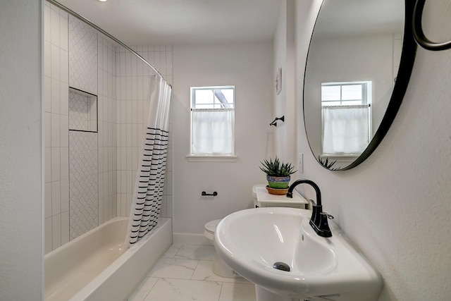 5120 Leeland St, Houston, TX 77023 - bathroom with plenty of natural light, a sink, shower / bath combination with curtain, and toilet