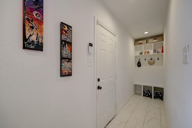 5120 Leeland St, Houston, TX 77023 - mudroom with light marble finish floors, recessed lighting, and baseboards