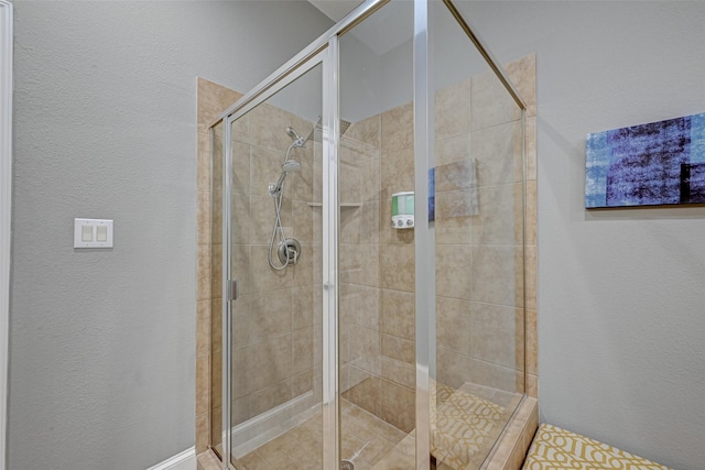 804 Paige St, Houston, TX 77003 - bathroom with a textured wall and a stall shower