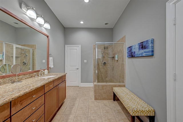 804 Paige St, Houston, TX 77003 - full bath with tile patterned flooring, a stall shower, vanity, and recessed lighting
