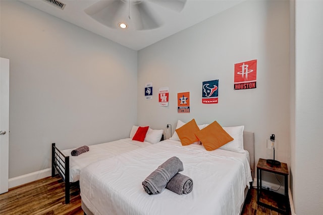 804 Paige St, Houston, TX 77003 - bedroom with wood finished floors, baseboards, a ceiling fan, and recessed lighting