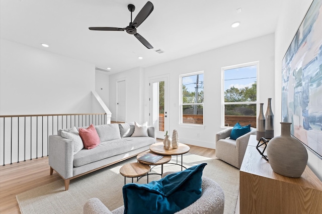 1428 Miller St, Houston, TX 77003 - living area with light wood-type flooring, ceiling fan, and recessed lighting