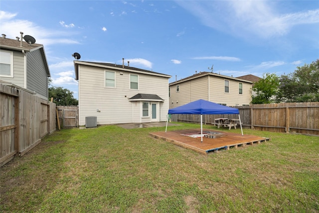 19442 Bold River Rd, Tomball, TX 77375 - back of house with a deck and central AC