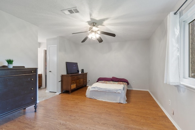 4315 Stallion Brook Ln, Spring, TX 77388 - bedroom featuring light wood-style floors and ceiling fan