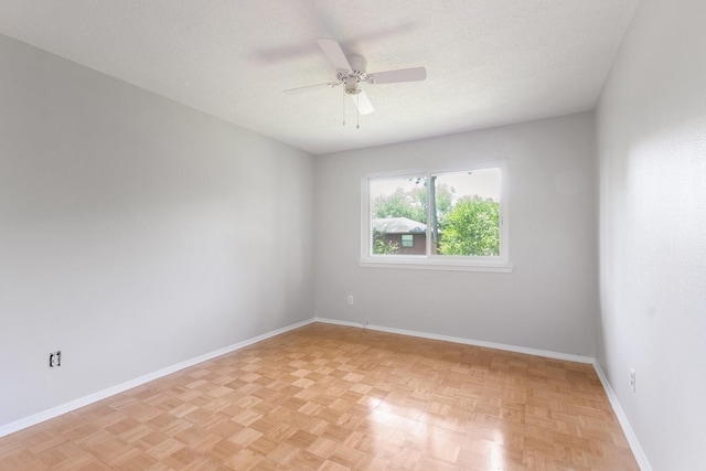 4315 Stallion Brook Ln, Spring, TX 77388 - unfurnished room with a ceiling fan, baseboards, and a textured ceiling