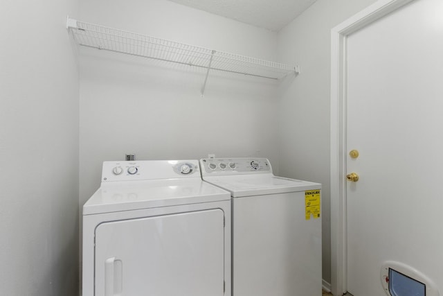 4315 Stallion Brook Ln, Spring, TX 77388 - laundry room featuring washer and clothes dryer