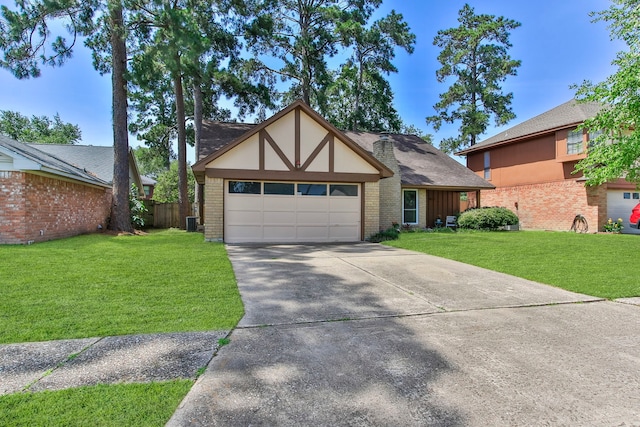 4315 Stallion Brook Ln, Spring, TX 77388 - english style home with brick siding, driveway, a garage, and central AC unit