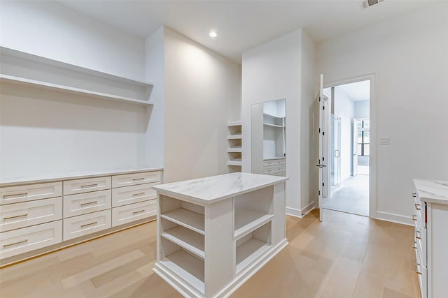9606 Maribelle Way, Houston, TX 77055 - walk in closet with light wood-style floors