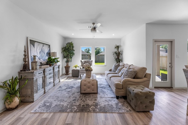 6545 Alexis St, Beaumont, TX 77708 - living area with wood finished floors, a ceiling fan, recessed lighting, and baseboards