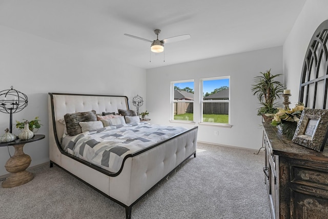 6545 Alexis St, Beaumont, TX 77708 - bedroom with carpet floors, a ceiling fan, and baseboards