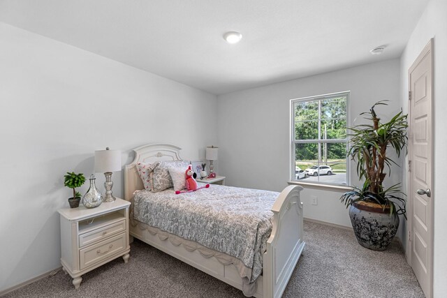 6545 Alexis St, Beaumont, TX 77708 - bedroom with carpet and baseboards
