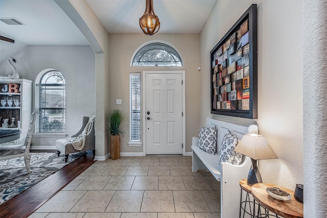 4818 Connor Dr, Baytown, TX 77521 - foyer featuring baseboards and arched walkways