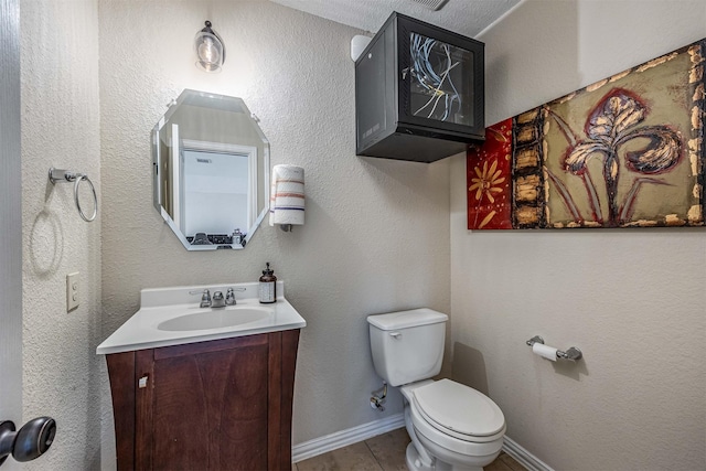 4818 Connor Dr, Baytown, TX 77521 - half bathroom with toilet, vanity, and baseboards