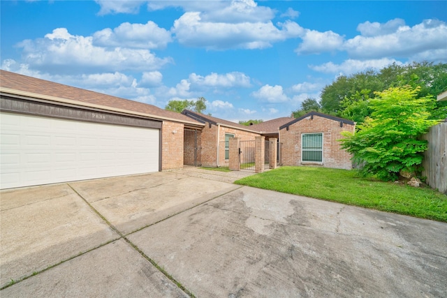 7838 Vickijohn Dr, Houston, TX 77071 - ranch-style home featuring brick siding, driveway, a gate, and an attached garage