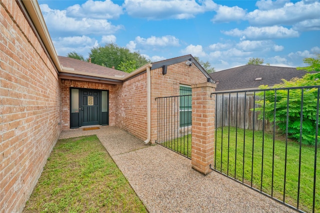 7838 Vickijohn Dr, Houston, TX 77071 - property entrance with brick siding and roof with shingles