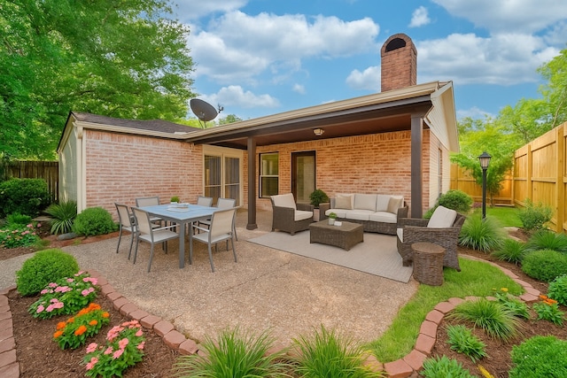 7838 Vickijohn Dr, Houston, TX 77071 - fenced backyard with outdoor lounge area, a patio area, and outdoor dining space