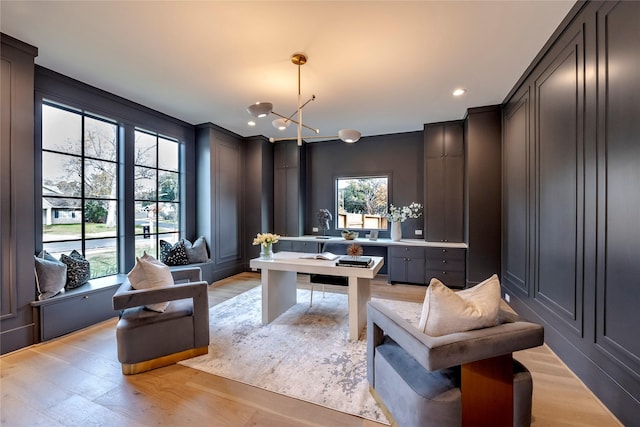 1322 Candlelight Ln, Houston, TX 77018 - office area with light wood-style flooring, a decorative wall, a chandelier, and recessed lighting