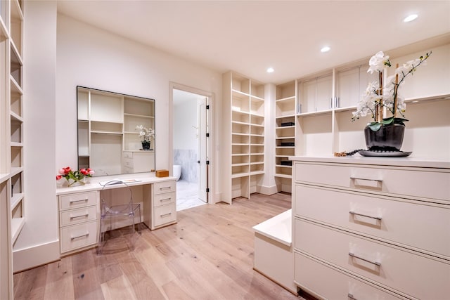1322 Candlelight Ln, Houston, TX 77018 - spacious closet with light wood-type flooring and built in desk