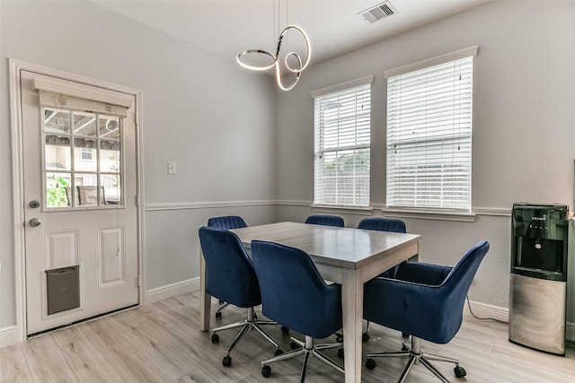 1753 Cranston Grove Dr, Dickinson, TX 77539 - dining room featuring light wood finished floors and baseboards