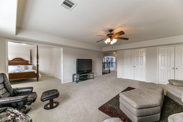 1753 Cranston Grove Dr, Dickinson, TX 77539 - carpeted living area with a ceiling fan and baseboards