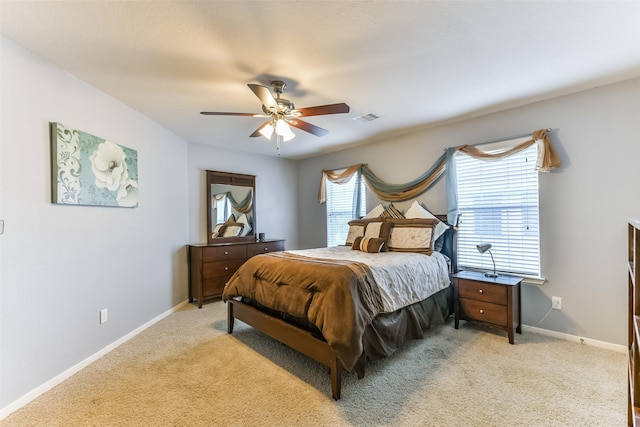 1753 Cranston Grove Dr, Dickinson, TX 77539 - bedroom with baseboards, light carpet, and ceiling fan