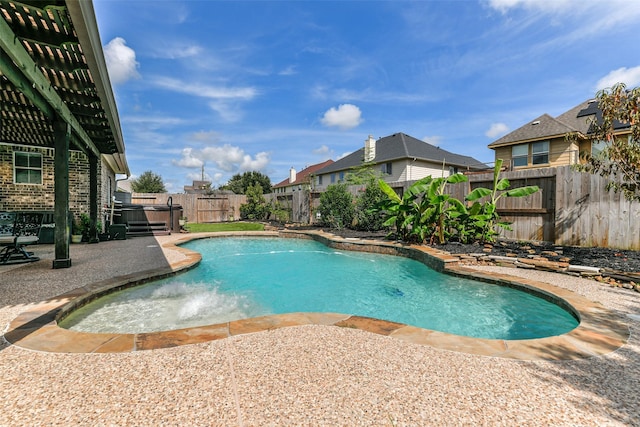 1753 Cranston Grove Dr, Dickinson, TX 77539 - view of swimming pool featuring a patio, a fenced backyard, a hot tub, and a residential view