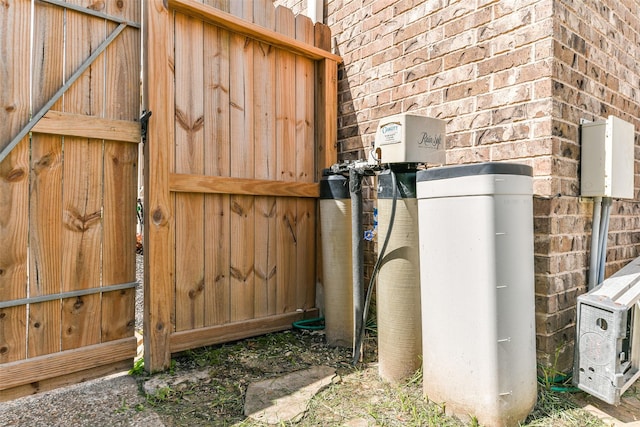 1753 Cranston Grove Dr, Dickinson, TX 77539 - exterior view of a water softener