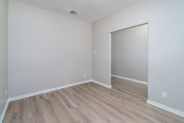 213 Splintered Arrow Dr, La Marque, TX 77568 - unfurnished room featuring light wood finished floors and baseboards