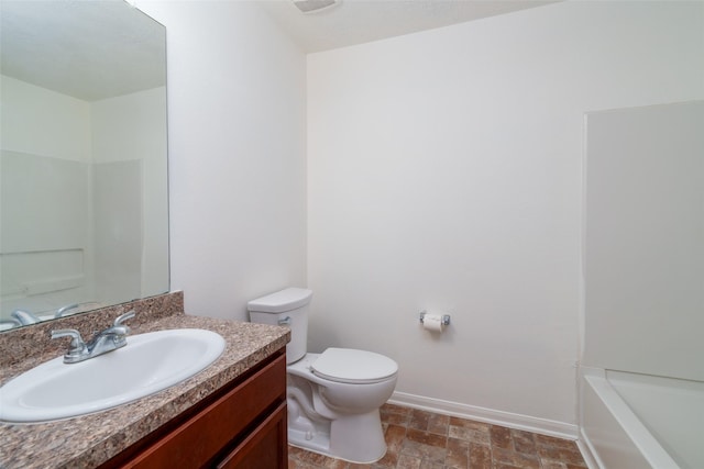 213 Splintered Arrow Dr, La Marque, TX 77568 - bathroom featuring toilet, vanity, baseboards, a bathtub, and a shower