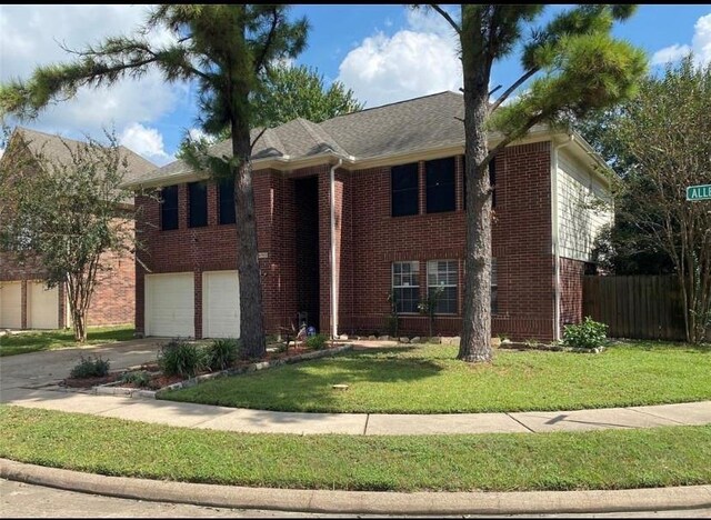 10702 Allens Landing Dr, Houston, TX 77065 - traditional-style home with a garage, brick siding, concrete driveway, and a shingled roof