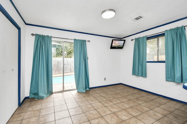 1207 Martingale Ct, Crosby, TX 77532 - unfurnished room with baseboards and light tile patterned floors