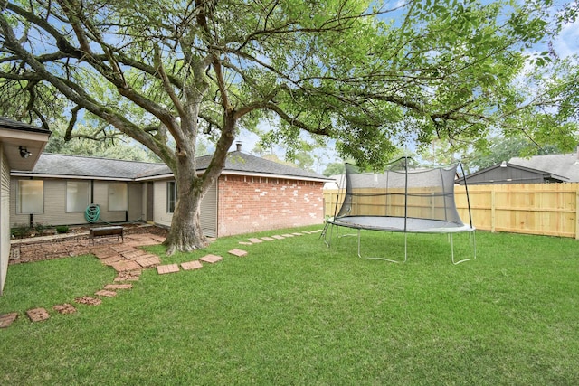 1207 Martingale Ct, Crosby, TX 77532 - view of yard featuring a trampoline