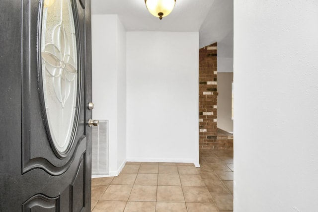 1207 Martingale Ct, Crosby, TX 77532 - foyer with light tile patterned flooring and baseboards
