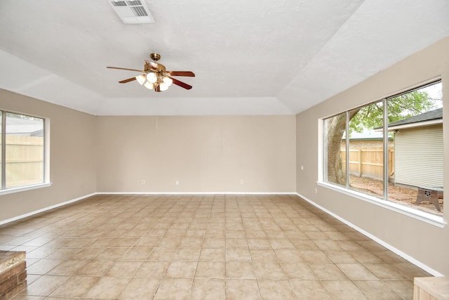 1207 Martingale Ct, Crosby, TX 77532 - unfurnished room featuring ceiling fan, light tile patterned floors, lofted ceiling, and baseboards
