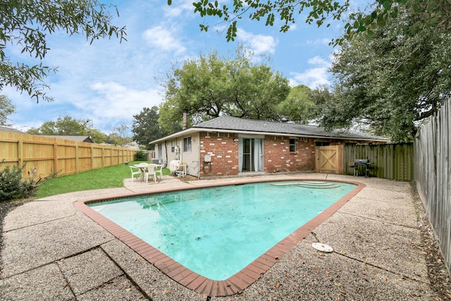 1207 Martingale Ct, Crosby, TX 77532 - view of swimming pool with a patio area and a fenced backyard