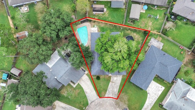 1207 Martingale Ct, Crosby, TX 77532 - aerial view of property and surrounding area with a pool area and property boundaries highlighted