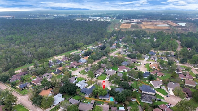 1207 Martingale Ct, Crosby, TX 77532 - aerial overview of property's location featuring a heavily wooded area and nearby suburban area