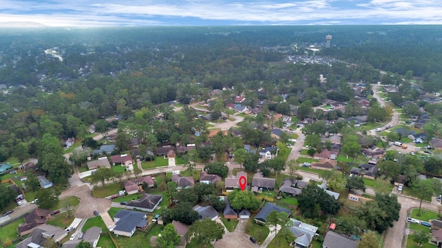 1207 Martingale Ct, Crosby, TX 77532 - aerial overview of property's location featuring a forest and nearby suburban area
