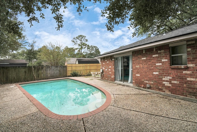1207 Martingale Ct, Crosby, TX 77532 - view of swimming pool featuring a patio and a fenced backyard