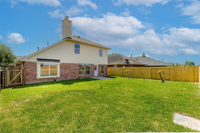 21511 Pepperberry Trl, Spring, TX 77388 - rear view of property with brick siding and a chimney