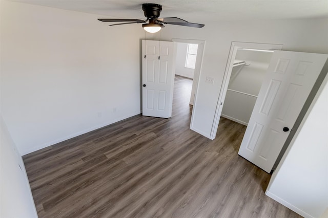 21511 Pepperberry Trl, Spring, TX 77388 - unfurnished bedroom featuring wood finished floors, baseboards, a closet, and a ceiling fan