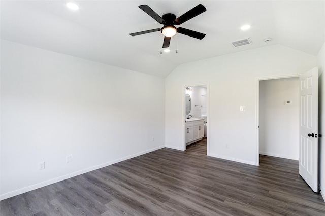 21511 Pepperberry Trl, Spring, TX 77388 - unfurnished bedroom with vaulted ceiling, dark wood-style floors, baseboards, ensuite bath, and ceiling fan