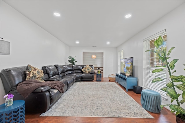 8223 Bairnsdale Ln, Houston, TX 77070 - living room featuring wood finished floors and recessed lighting
