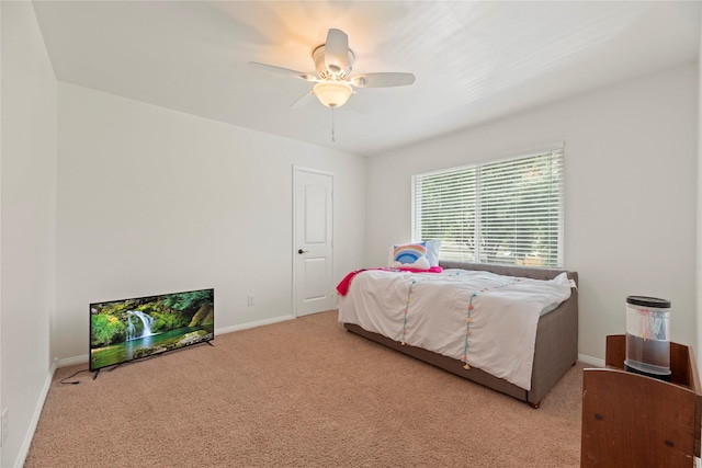 8223 Bairnsdale Ln, Houston, TX 77070 - bedroom with carpet flooring, baseboards, and a ceiling fan