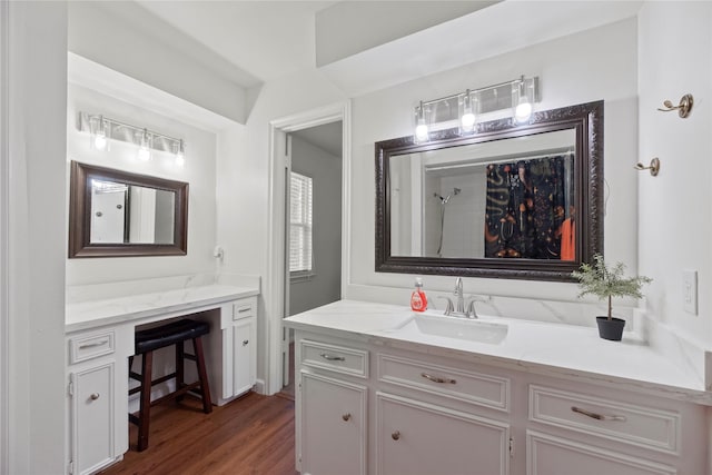 8223 Bairnsdale Ln, Houston, TX 77070 - bathroom featuring vanity, wood finished floors, and a shower