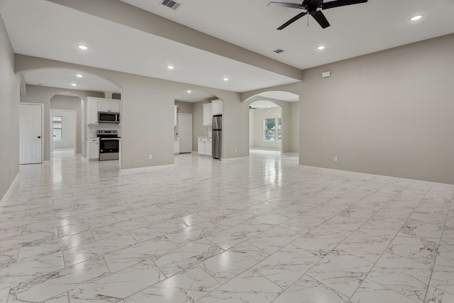 69 County Road 3668, Splendora, TX 77372 - unfurnished living room featuring a ceiling fan, recessed lighting, and baseboards
