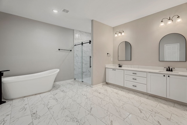 69 County Road 3668, Splendora, TX 77372 - full bathroom featuring a shower stall, marble finish floors, double vanity, and a soaking tub